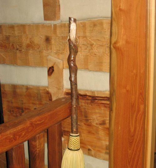 Face Carved in Custom Broom Handle